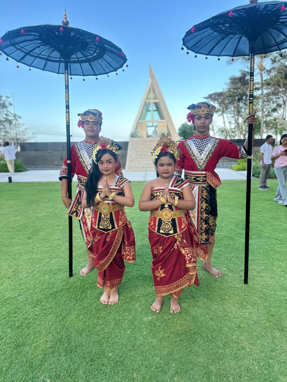 Balinese Girl And Umbrella Boy